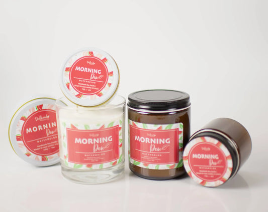 Morning Dew Candle Set collection.  Scent is watermelon with pink labels.  8 and 4oz amber jars, 8 and 4 oz tins and a clear 10oz jar